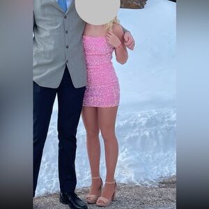 Lucy in the sky 
Light pink sequence mini dress